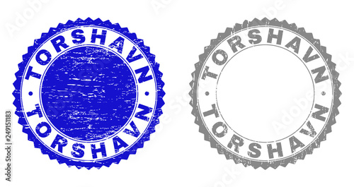 Grunge TORSHAVN stamp seals isolated on a white background. Rosette seals with grunge texture in blue and grey colors. Vector rubber stamp imitation of TORSHAVN tag inside round rosette.