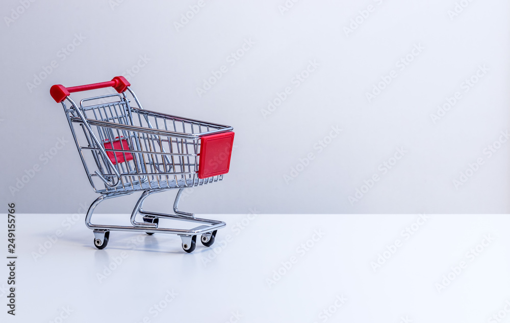 Sale: Shopping cart with copy space, grey