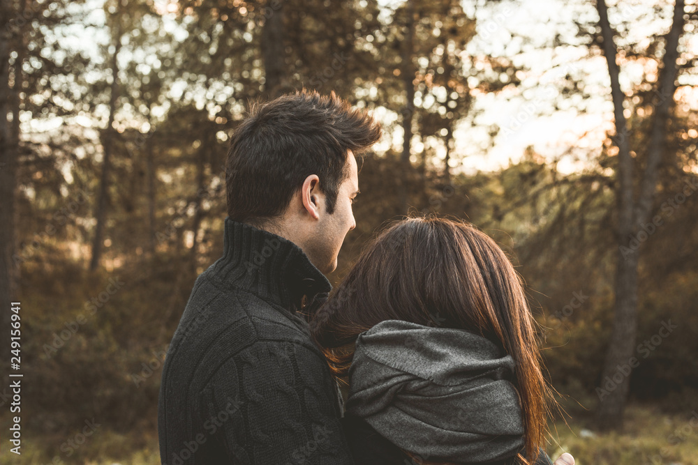 Couple of guy and girl hugged and happy in the field.Photo style social networks and vintage Couple of guy and girl hugged and happy in the field.Photo style social networks and vintage