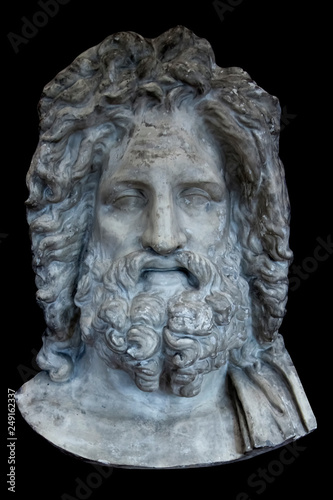 Antique roman marble statue God Zeus. The king of the gods the ruler of mount Olympus and the god of the sky and thunder. Isolated on black background.