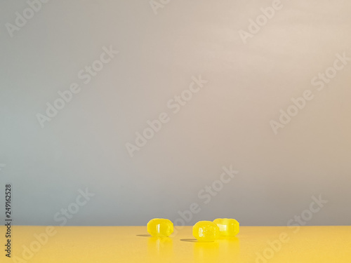 Yellow lollipops. Yellow candy. Lollipops close up. photo