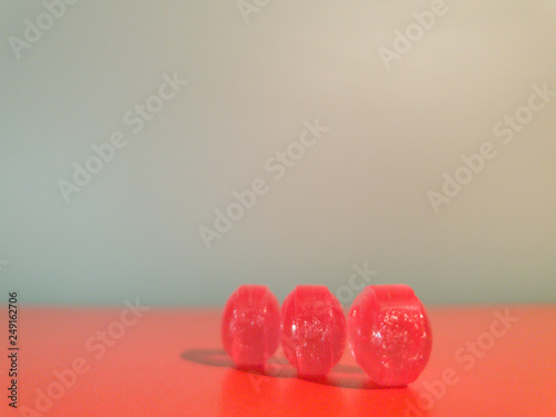 Red lollipops. Red candy. Lollipops close up. photo