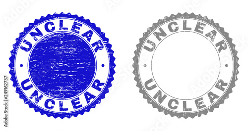Grunge UNCLEAR stamp seals isolated on a white background. Rosette seals with grunge texture in blue and grey colors. Vector rubber stamp imprint of UNCLEAR label inside round rosette.