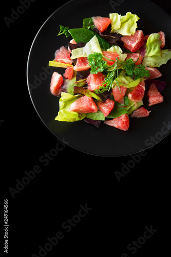 Healthy salad grapefruit and green leaves. Deliciouse dietary food. lose weigh. Copy space.