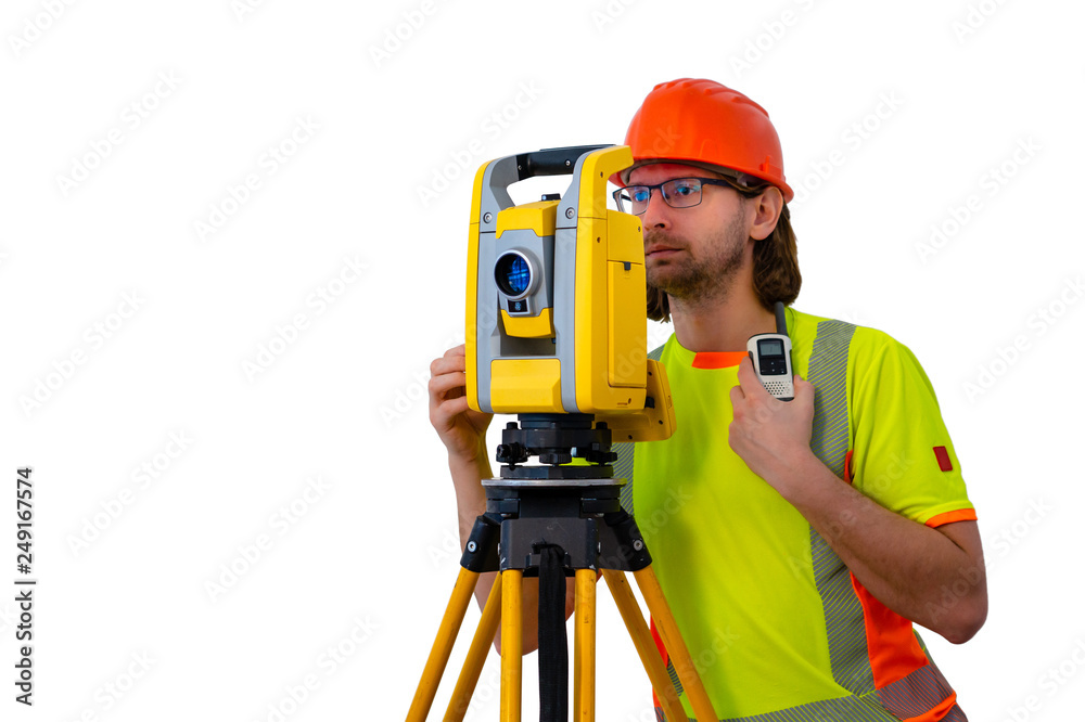 Working surveyor engineer in helmet with his equipment isolated on white background Working surveyor engineer in helmet with his equipment isolated on white background