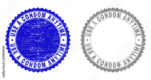 Grunge USE A CONDOM ANYTIME stamp seals isolated on a white background. Rosette seals with grunge texture in blue and gray colors.