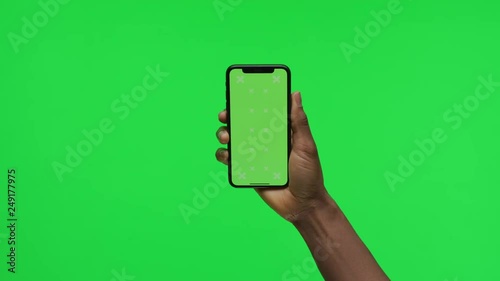 Female Hand holding Green Screen Smartphone holding still