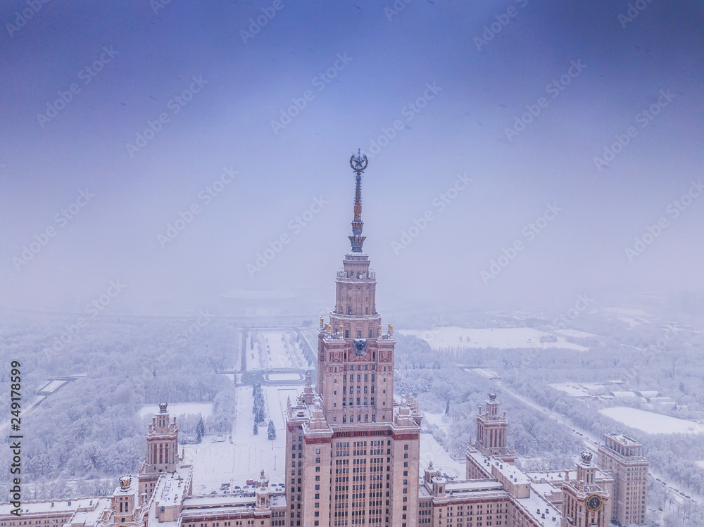 Aerial view of the Moscow historical high-rise building in winter cloudy weather.