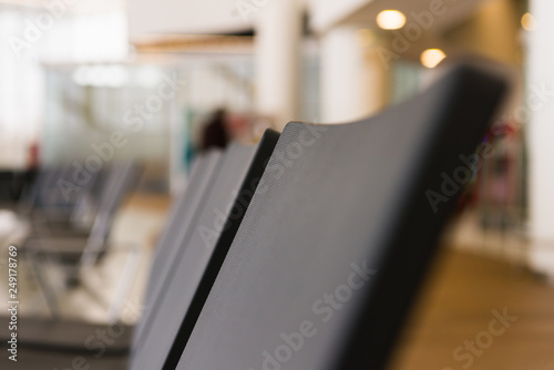 Wallpaper Mural Empty airport terminal waiting area with chairs. Close up photo Torontodigital.ca