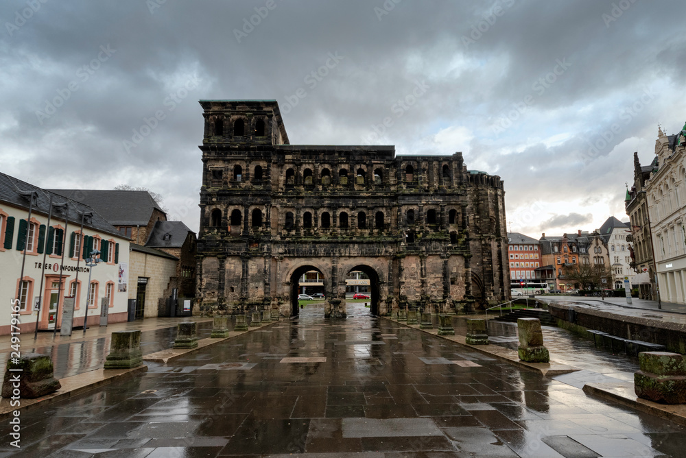 Trier / Germany - February 9 / 2019 : Front wide angle view from the city side of PortaNigra