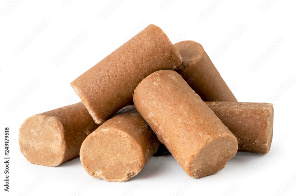 Heap of chocolate bars close up on a white. Isolated.
