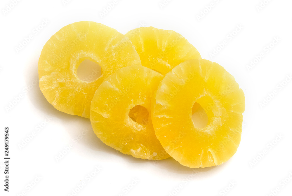 Slices of dried pineapple on a white isolated background_ Slices of dried pineapple on a white isolated background_