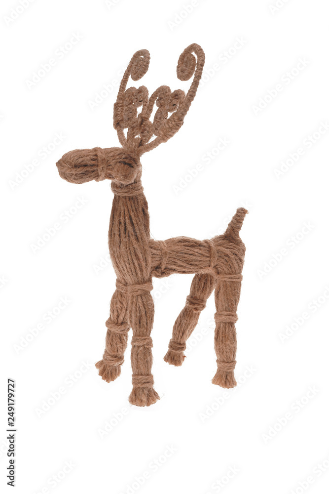 Deer figurine with beautiful branchy horns handmade from jute thread isolated on white background. Deer figurine with beautiful branchy horns handmade from jute thread isolated on white background.