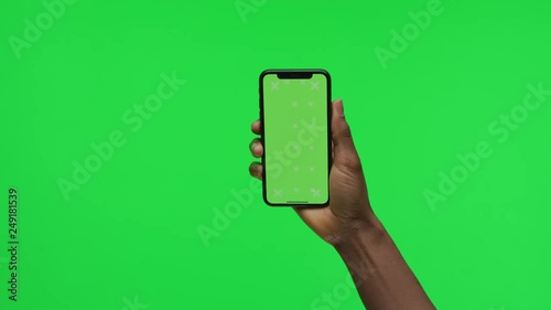 Female Hand holding Green Screen Smartphone folding up