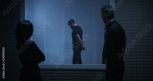 Woman identifying criminal in line-up