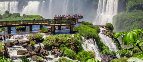 Tourists on the platform in Iguazu National Park, Argentina photo
