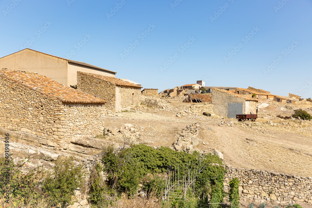 rustic stone made houses in Monforte de Moyuela, province of Teruel, Aragon, Spain
