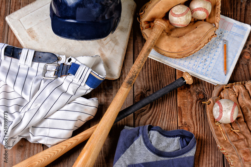 Canvas Print Overhead view of baseball gear on a rustic wood surface