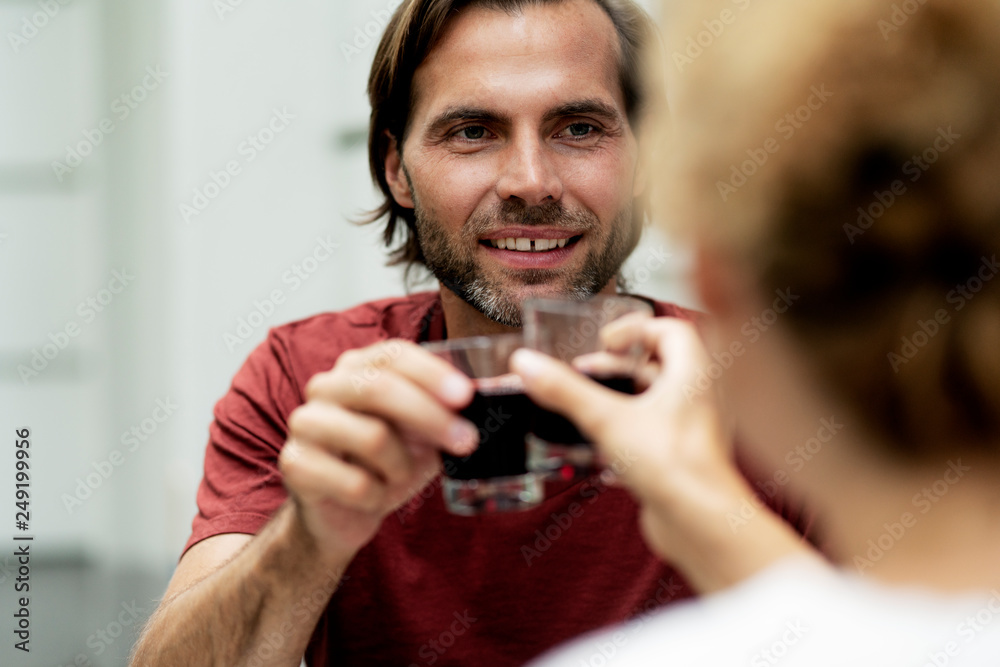 Happy couple toasting with red wine Happy couple toasting with red wine