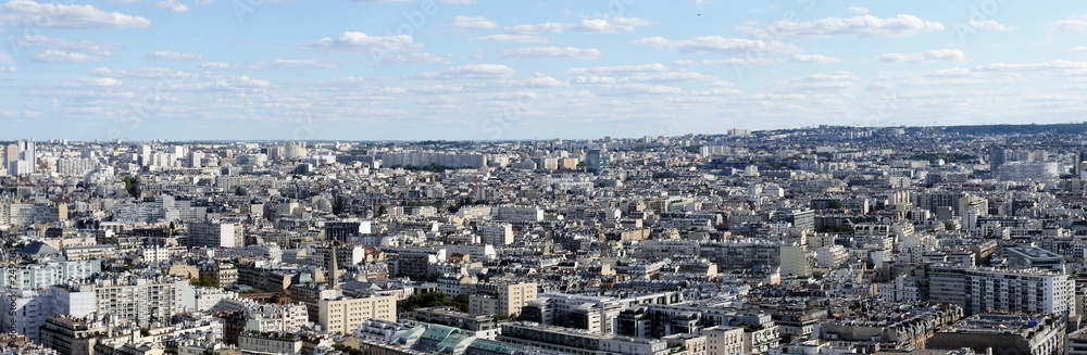 Panorama picture overview of the sea of ​​houses of Paris, urban life in a narrow space, view to the east.