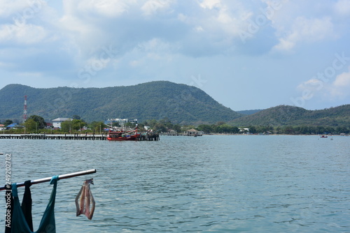 Close-up photos of small fishing boats at the fishing fishing port, Bang Saray Subdistrict, Sattahip District, Chonburi Province. Fishing boat view, sky and sea on a bright day photo