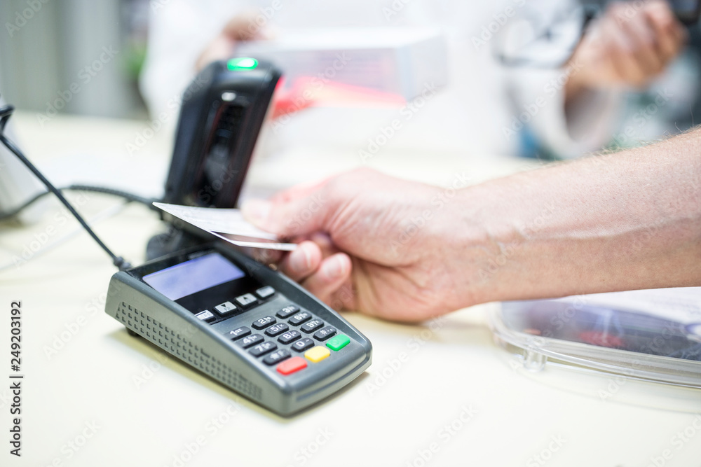 Cashless payment at shop counter Cashless payment at shop counter