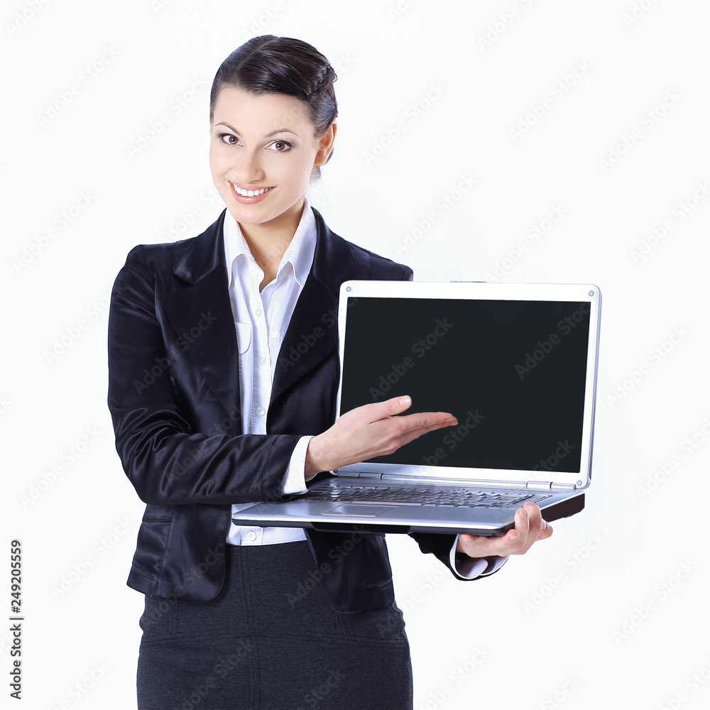 successful business woman is standing with an open laptop successful business woman is standing with an open laptop