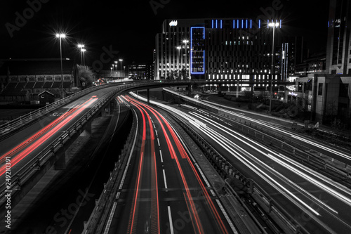 Traffic in city at night with light trails