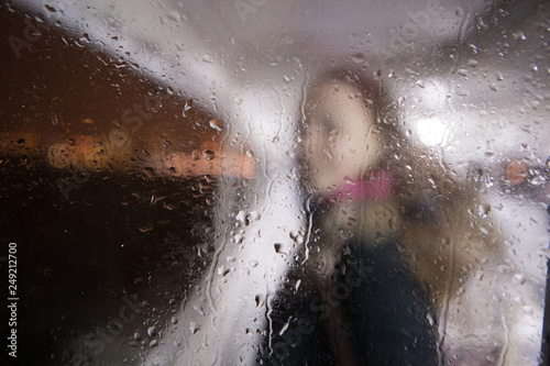 rain drops portrait on window