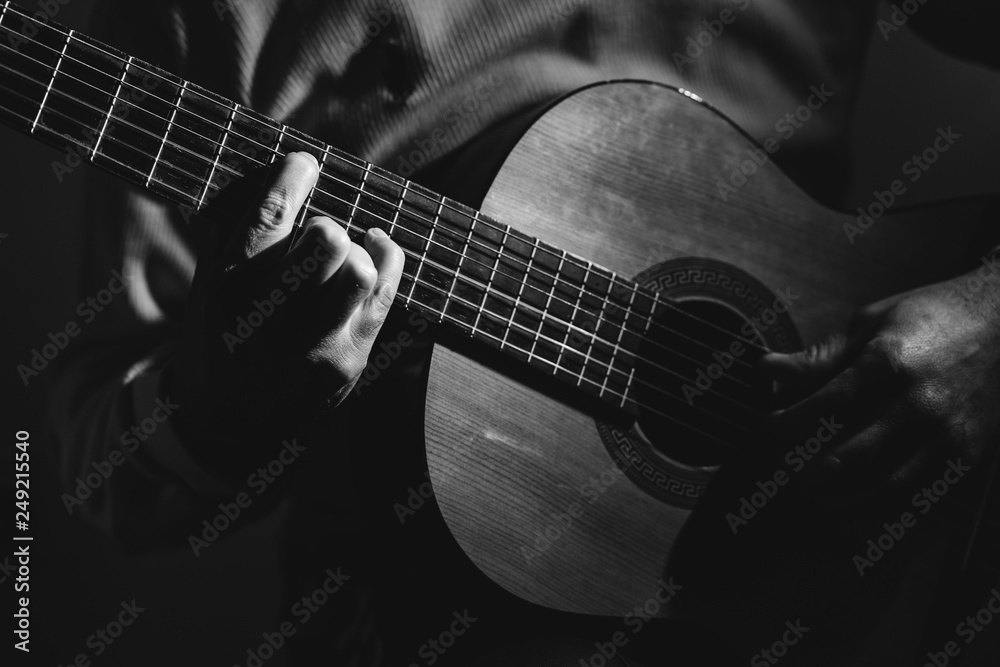 Close Up on Man Playin A Guitar, black and white