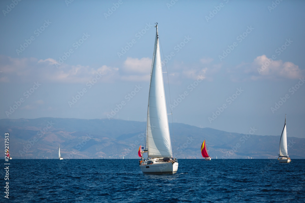 Fototapeta premium Sailing luxury yacht boats in Aegean Sea - Greece.
