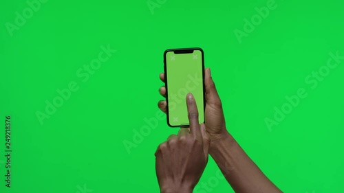 Female Hand holding Green Screen Smartphone touch