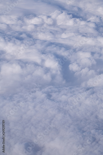 Fototapeta Naklejka Na Ścianę i Meble -  Beautiful Above clouds from an airplane