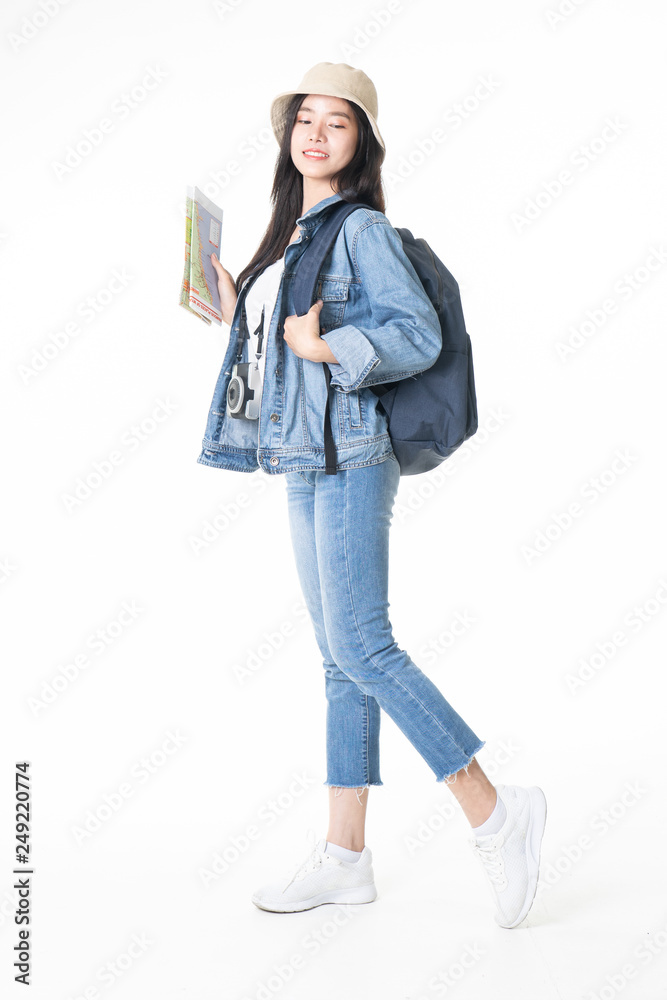 Beautiful young woman smiling and pulling pink colour luggage isolated on white background.Asian woman going to summer vacation.Travel trip funny. Beautiful young woman smiling and pulling pink colour luggage isolated on white background.Asian woman going to summer vacation.Travel trip funny.