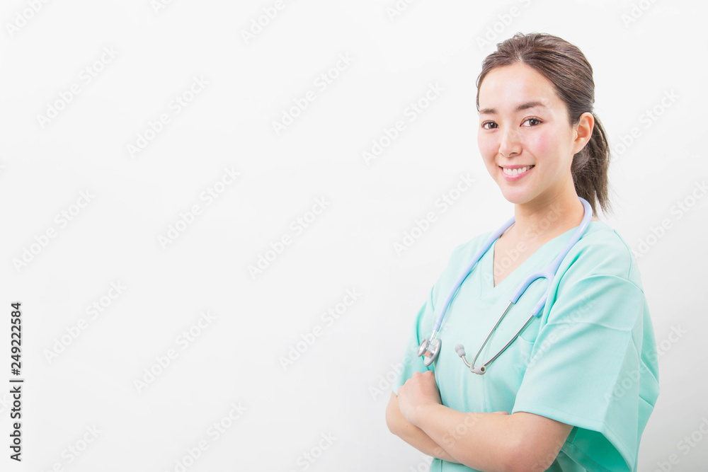 Young doctor woman wearing medical nurse uniform over isolated white background with a happy smile Young doctor woman wearing medical nurse uniform over isolated white background with a happy smile