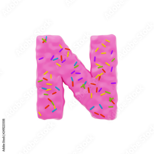 Isolated letter shaped cake with icing and sprinkles on top