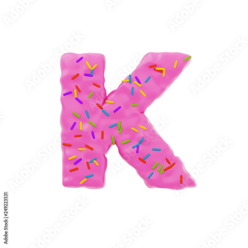 Isolated letter shaped cake with icing and sprinkles on top