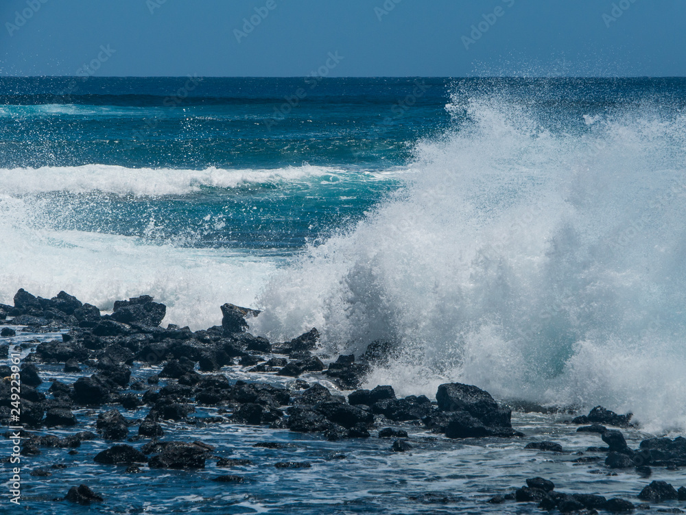 waves crashing on rocks