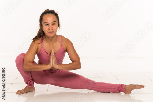 Yoga poses with young Filipino girl 