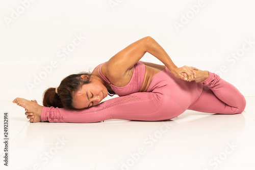 Yoga poses with young Filipino girl 