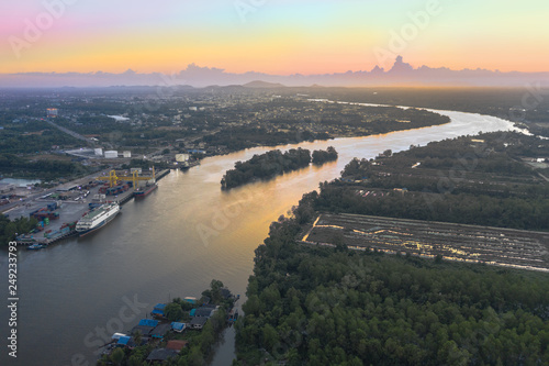 aerial photography sunset above Sri Surat bridge across Tapee river Surat Thani Thailand