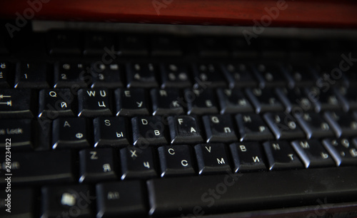 PC computer keyboard close up top side view working abstract background. Communication technology digital electronic device