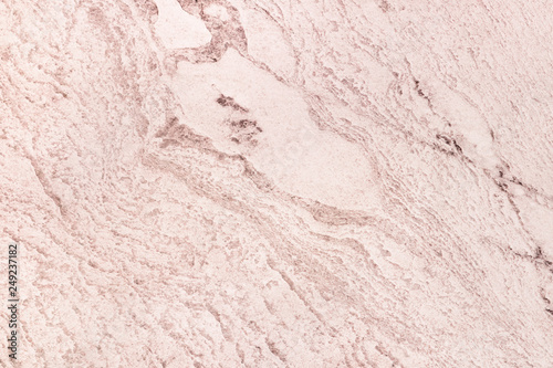Close up of a pink rough wall texture