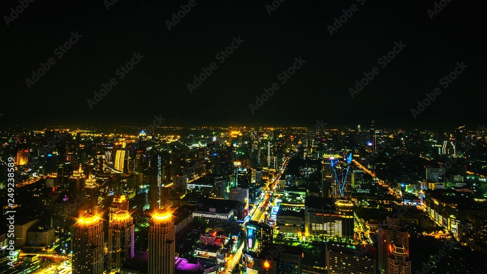 Cityscape of Bangkok Downtown at Night, Aerial urban View of Bangkok Expressway and City at Night from the Baiyoke Sky Tower, Bangkok - Thailand