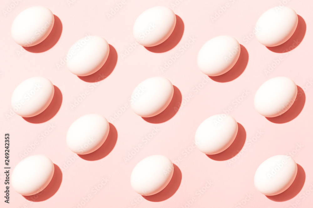 Eggs pattern on pink background