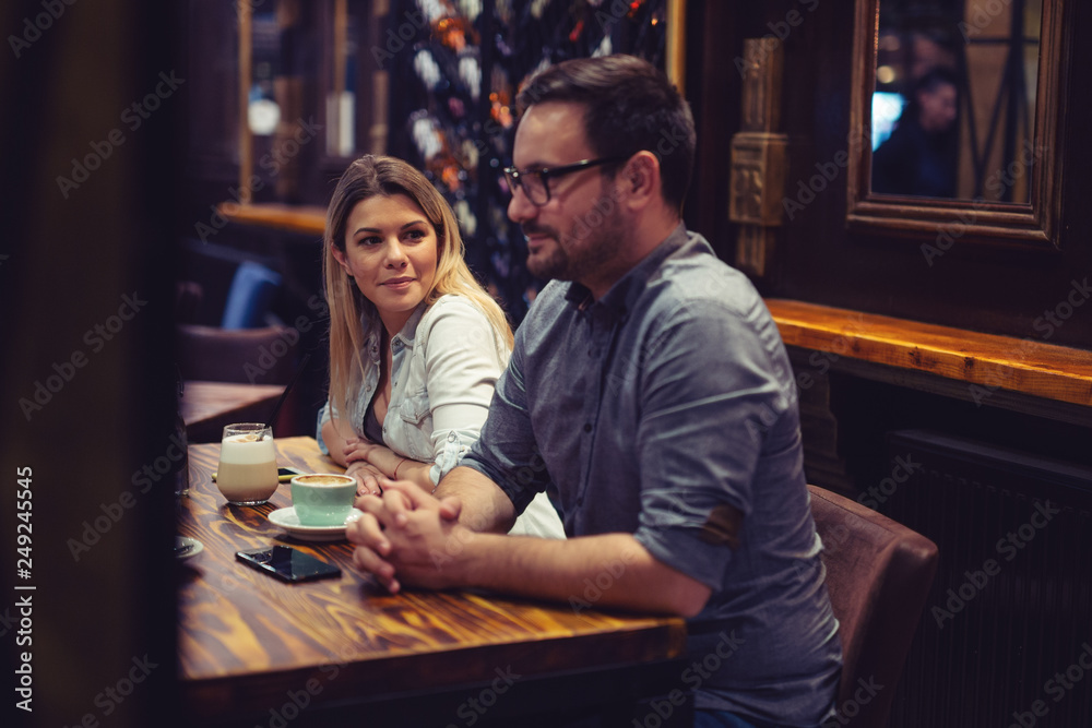 Beautiful happy friends enjoying their afternoon coffee Beautiful happy friends enjoying their afternoon coffee
