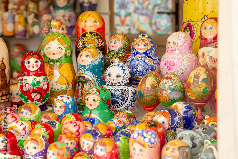 MOSCOW, RUSSIA - FEBRUARY 13,2019: Large selection of matryoshkas Russian souvenirs at the gift shop. Nesting dolls are the most popular souvenirs from Russia
