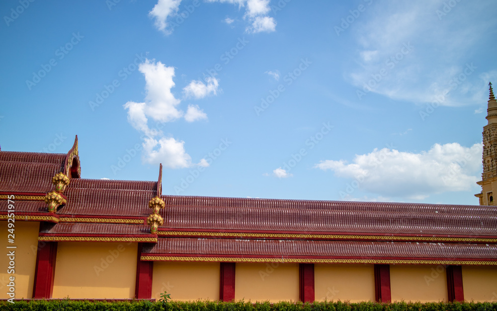 Temple roof on beautiful cloud sky Temple roof on beautiful cloud sky