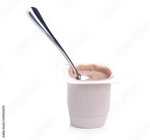 Chocolate truffle yogurt with spoon on a white background. Isolation