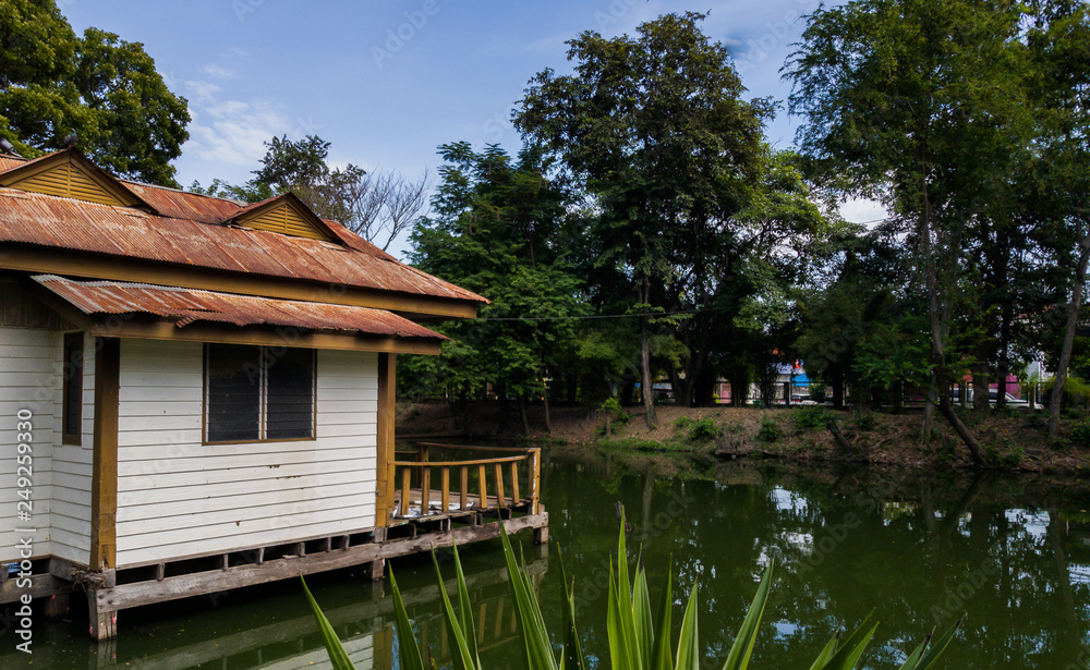 wooden house along the lush Ada Bojana riverside, Thailand wooden house along the lush Ada Bojana riverside, Thailand